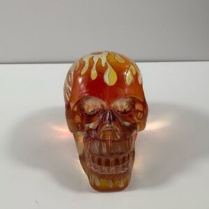 Veronese Design Translucent Resin Skull Sculpture with a Flame Design